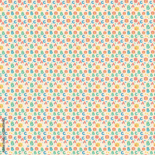 ABC alphabet seamless pattern: cute letters, building blocks and stars in coral, yellow, mint and sky blue on cream. Tileable nursery vector pattern for fabric and decor.