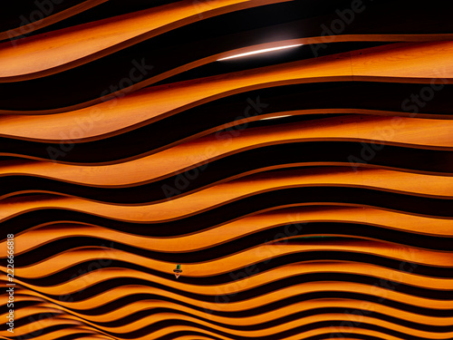 Abstract wooden wave ceiling architectural design interior background