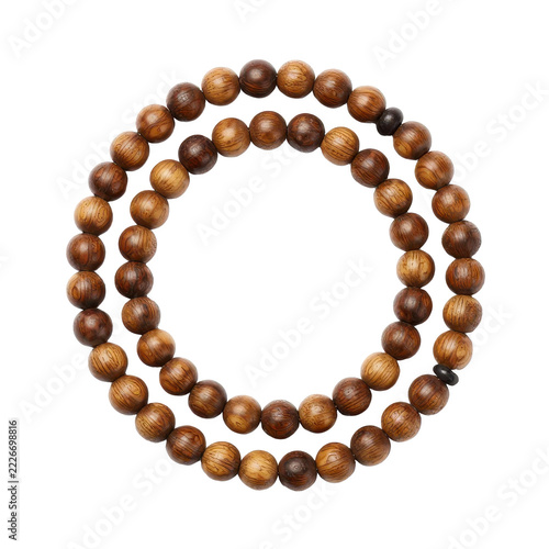 Wooden prayer beads isolated on black background