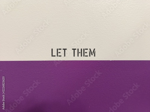 Purple wall with typography - Let Them - means to allow other people to do, or say whatever they want without trying to control, fix, or change them