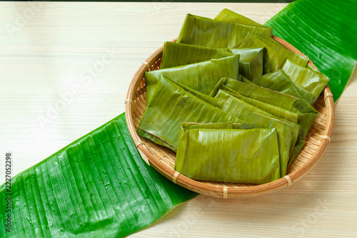 Yaeyama Rice Cakes in a Bamboo Basket on a Banana Leaf