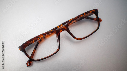 Tortoiseshell Eyeglasses Resting on a Light Gray Surface