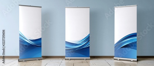 Three roll-up banners stand side by side