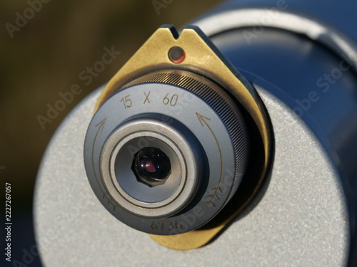Fotografie silver metallic eyepiece of a tourist coin-operated telescope, featuring brass a