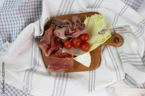 Cold Cut, Parma Ham , Platter with Cured Meats, Camembert, and Cherry Tomatoes