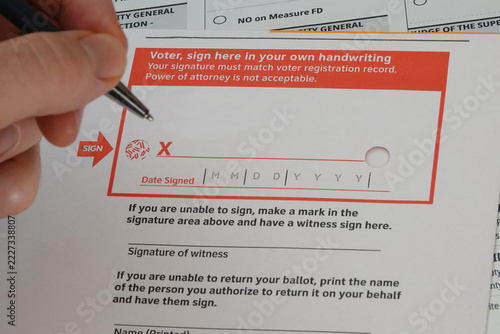 A signature box is shown on an mail-in ballot envelope, allowing election officials to compare signatures to those on file in voter registration records on file.
