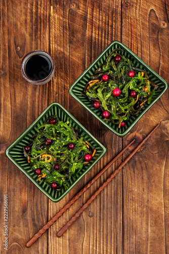 Seaweed salad bowl with cranberries,vegan superfood.