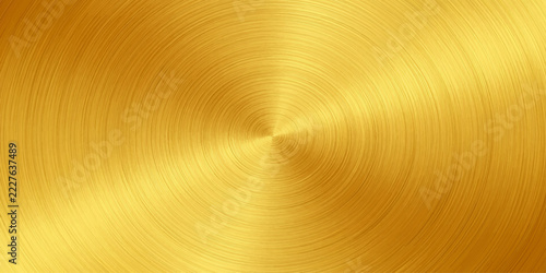 A golden metallic surface with circular brushed texture, creating a luxurious and radiant background effect.