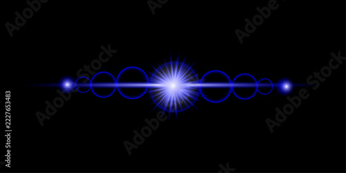Bright blue glowing horizontal light flare isolated on a deep black background for design overlays