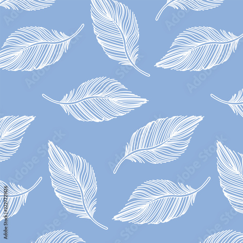 pattern of white feathers on a blue background