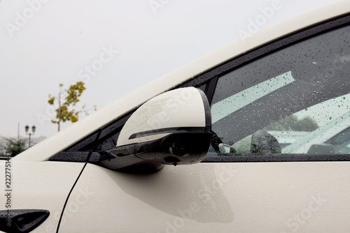 View of a modern car's side-mirror system featuring electronic cameras