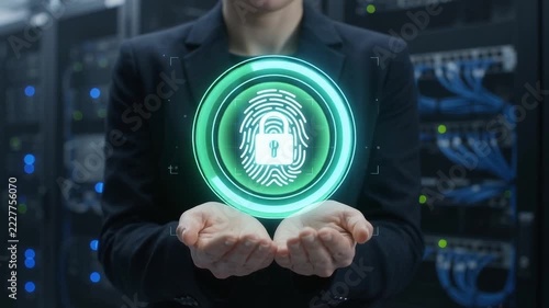 Person holding digital biometric fingerprint security icon with lock in data center, cyber security concept footage.