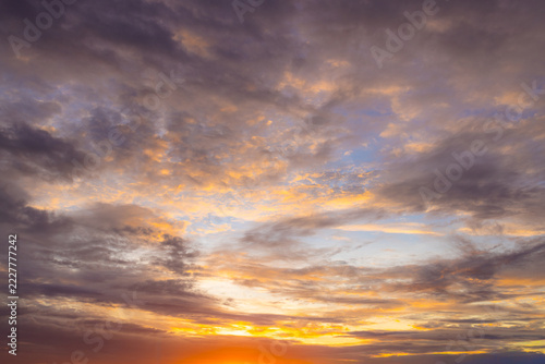 Dramatic Sunset Sky with Colorful Pastel Clouds Panoramic Banner,Panoramic wide view of a stunning sunset sky featuring a rich gradient of purple, violet, and warm orange clouds, ideal for nature land