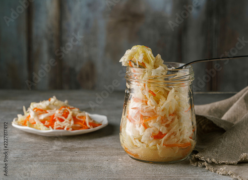sauerkraut in a jar sauerkraut in a jar on a dark background