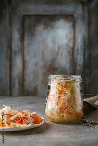 sauerkraut in a jar sauerkraut in a jar on a dark background