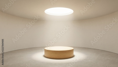 Circular wooden podium illuminated by overhead light