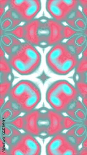 Vibrant abstract kaleidoscope pattern with fluid pink and turquoise shapes.