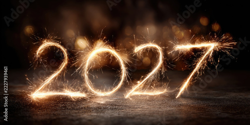 Numbers 2027 creating a festive greeting with shining sparklers, symbolizing an upcoming new year, celebration, and bright future against a dark background with bokeh lights