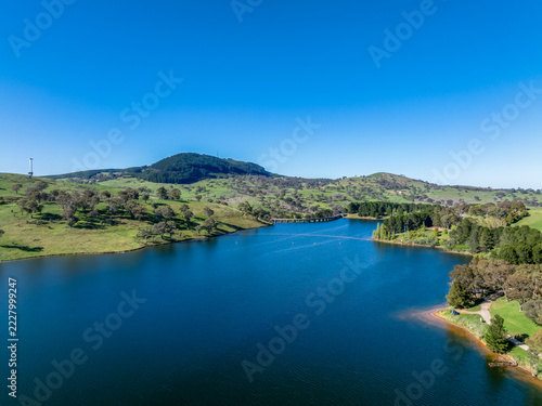 Aerial scenic views over Carcoar Dam with blue sky
