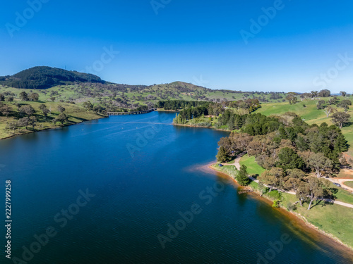 Aerial scenic views over Carcoar Dam with blue sky