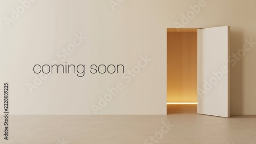 A beige wall features the text coming soon next to an open doorway with warm interior light with walls flooring partially empty