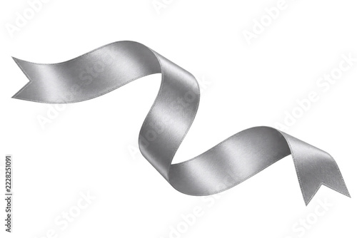 Flowing silver satin ribbon with fishtail ends isolated