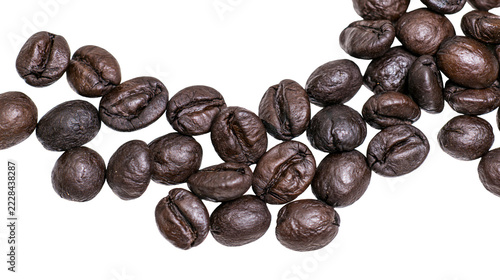 Fotografie Dark roasted aromatic coffee beans arranged in a curved line