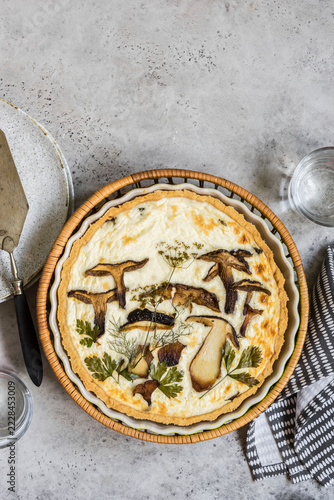 Rural Wild mushroom and Cream Cheese Tart with herbs in pastry crust