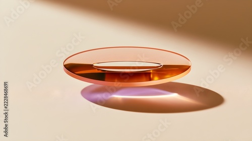 A flattened amber ellipse with a narrow curved slot