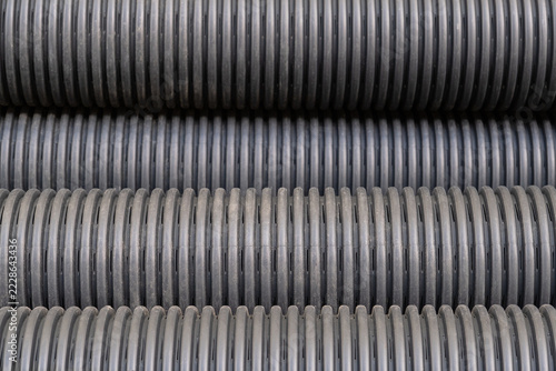 industrial material creates a seamless geometric pattern for underground water drainage systems.