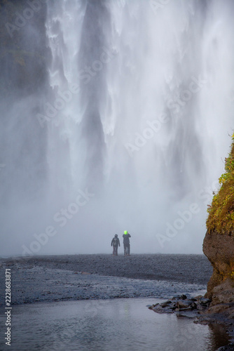 skogafoss waterfall with tourists