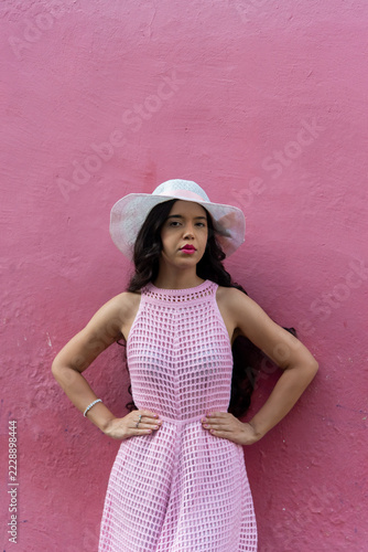 Woman in a Pink Dress and White Hat
