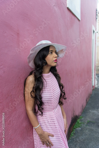 Woman in a Pink Dress and White Hat