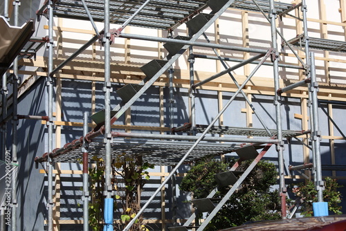 Metal Scaffolding with New Wooden Frame at Japanese Building Renovation Site