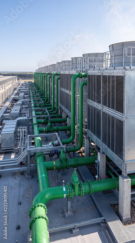 Data Center Cooling Towers with Large Green Industrial Pipes