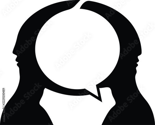 Two human head silhouettes facing each other with a central speech bubble icon for communication and dialogue