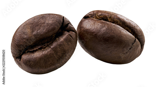 Fotografie Two roasted dark brown coffee beans with textured surfaces