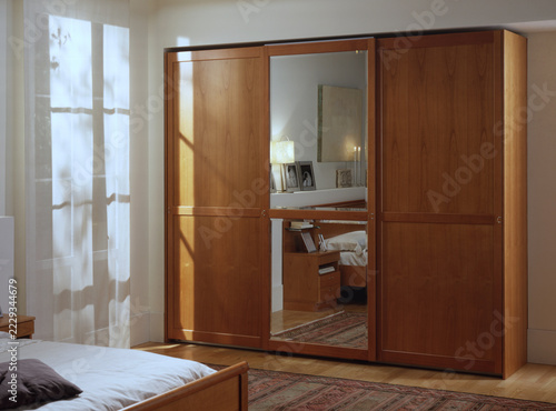 Single shot photo of a room with a wardrobe