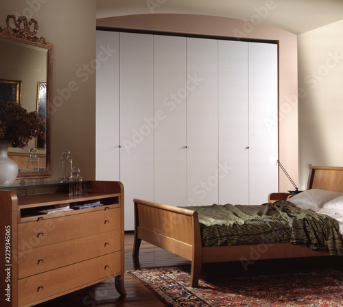 Single shot photo of a room with a wardrobe