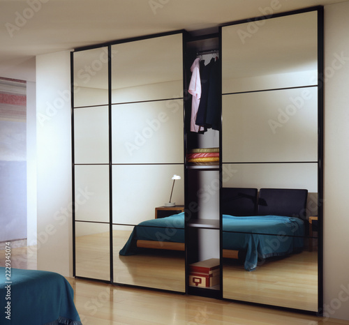 Single shot photo of a room with a wardrobe