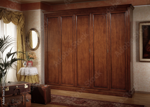 Single shot photo of a room with a wardrobe