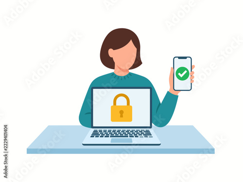 A woman working on a computer featuring a security padlock icon on the screen while simultaneously holding up a mobile phone displaying a green verification checkmark symbol for authentication