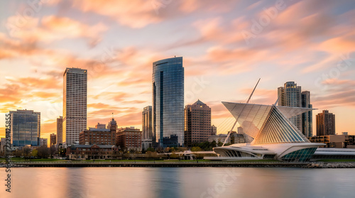 Modern city skyline with unique architecture at golden hour sunset