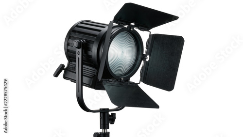 Fotografie Black Fresnel film light with adjustable barn doors, isolated on transparent bac