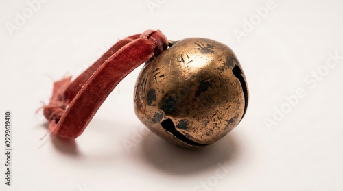 Vintage Brass Jingle Bell Red Ribbon White BG.