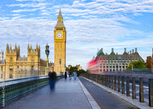 view of the illuminated Big Ben clock tower, Traffic Light Trails on Westminster Bridge in London, United Kingdom