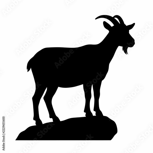 Black Silhouette Illustration of a Standing Goat on a Rocky Mountain Peak Isolated on a Plain White Background