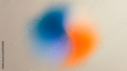 Abstract soft blur gradient background with blue and orange colors mixing