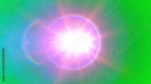 Bright glowing orange and blue optical lens flare effect moving smoothly across vibrant green screen background