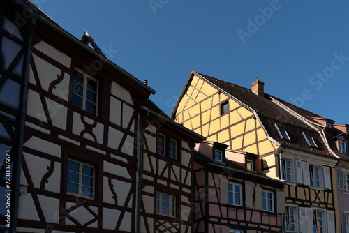 A close-up of the roofs and the typical half-timbered architecture of the houses in Colamr, Alsace 